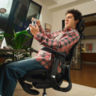 a man sitting in a gray HBADA E3 AIR ergonomic gaming chair playing VR ~scene