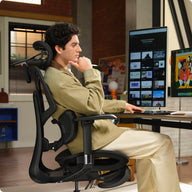 a man sitting in a gray HBADA E3 AIR ergonomic gaming chair playing VR ~scene